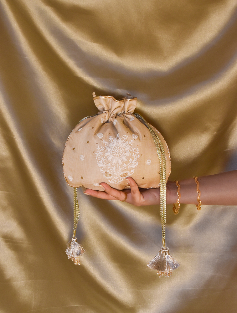 Beige Tussar Silk Chikankari Rounded Potli Evening Bag Main Image